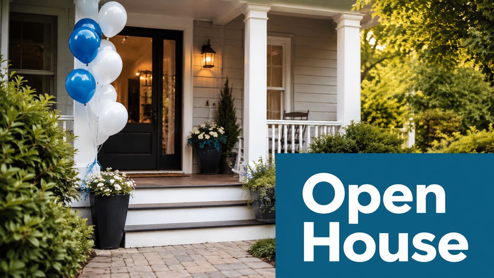 A welcoming front porch of a house decorated with blue and white balloons for an open house event.